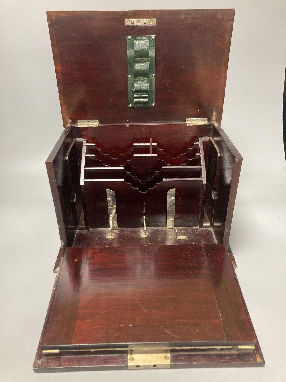 An Edwardian inlaid mahogany writing box, with hinged folding slope and fittings, 29cm, and a Victorian walnut and parquetry tea caddy,